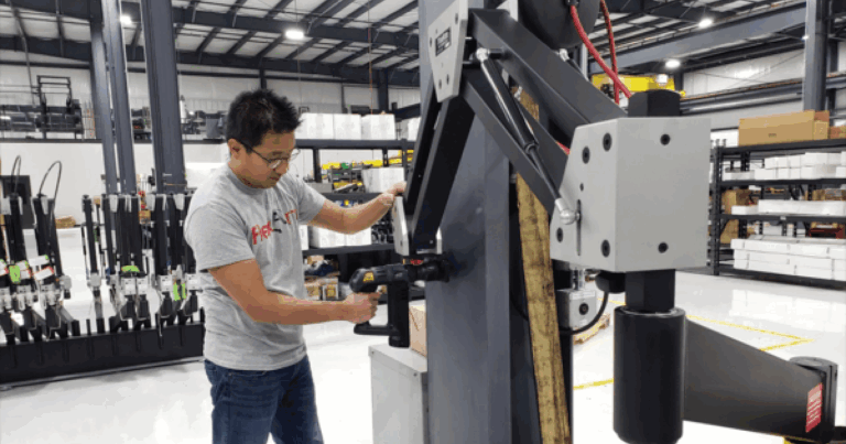 Torque Reaction Arm holding Atlas Copco tool